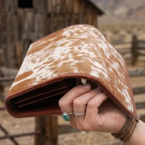 cowhide trifold wallet n hand